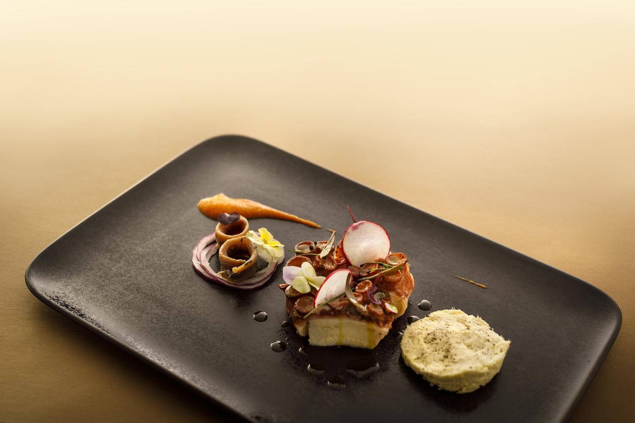 Boutique & Design Hotel Navis - Small Luxury Hotels Of The World Opatija Exteriör bild A dish by the restaurant