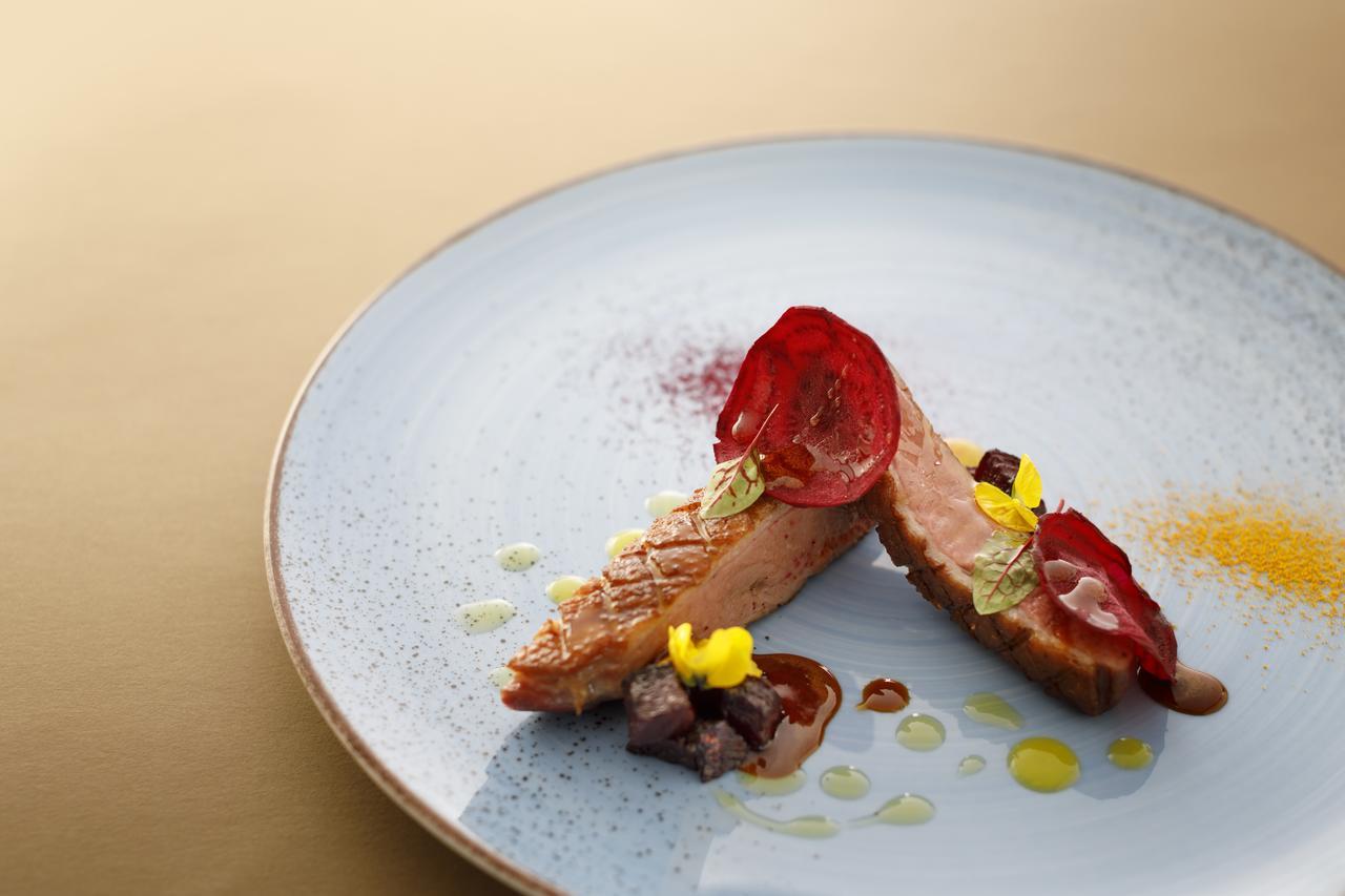 Boutique & Design Hotel Navis - Small Luxury Hotels Of The World Opatija Exteriör bild A modern French dish