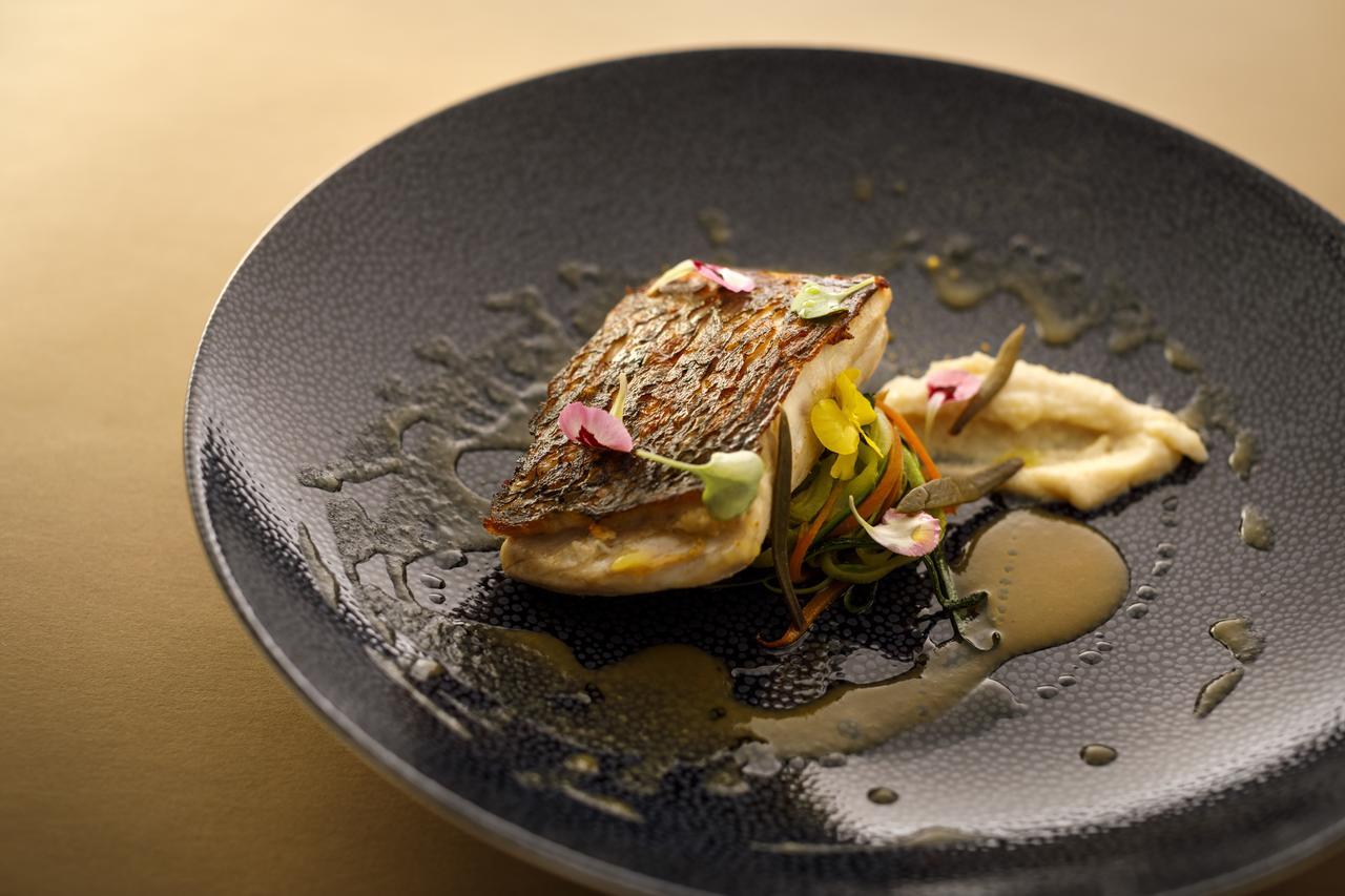 Boutique & Design Hotel Navis - Small Luxury Hotels Of The World Opatija Exteriör bild A dish prepared by the restaurant